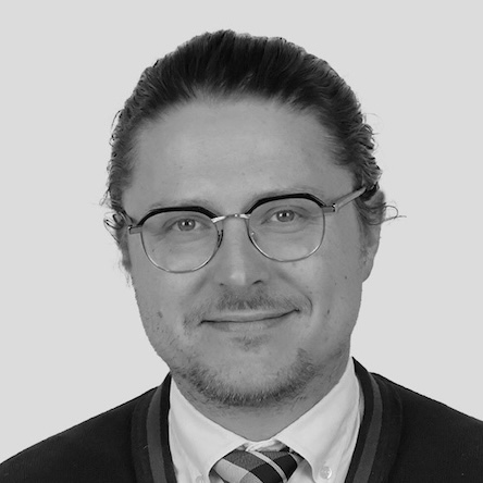 Louis Allavana's headshot, greyscale