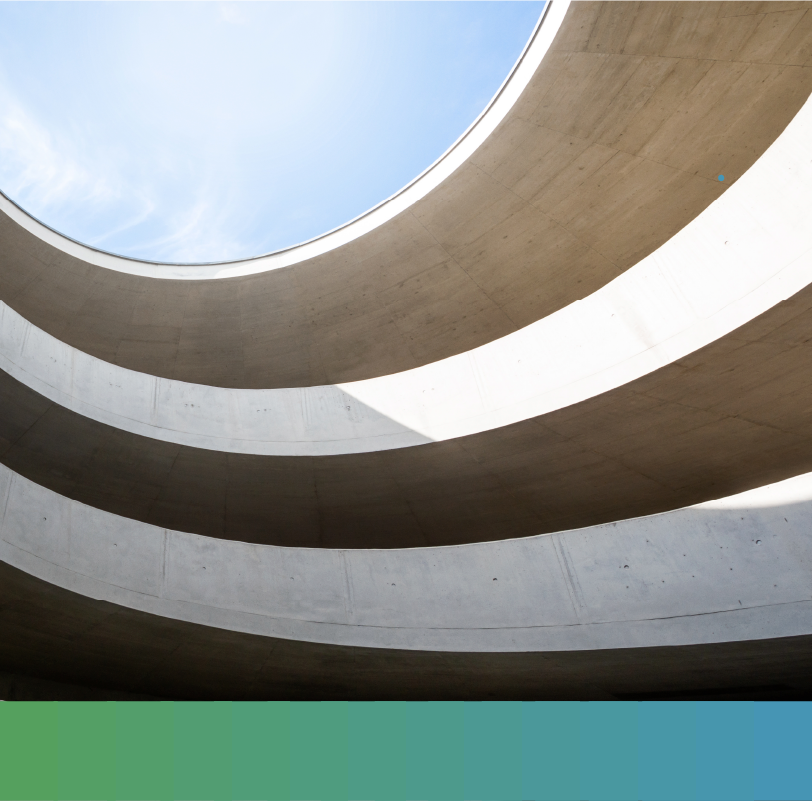 Photo looking up at cement modern architecture