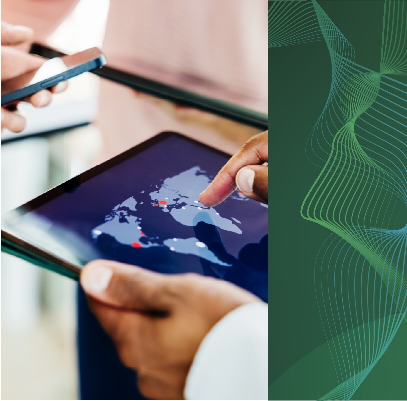 Employees look at global hotspots on an atlas displayed on mobile screens.
